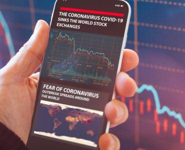 Smartphone showing coronavirus stock market crash