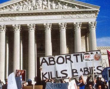 Abortion placards Supreme Court steps